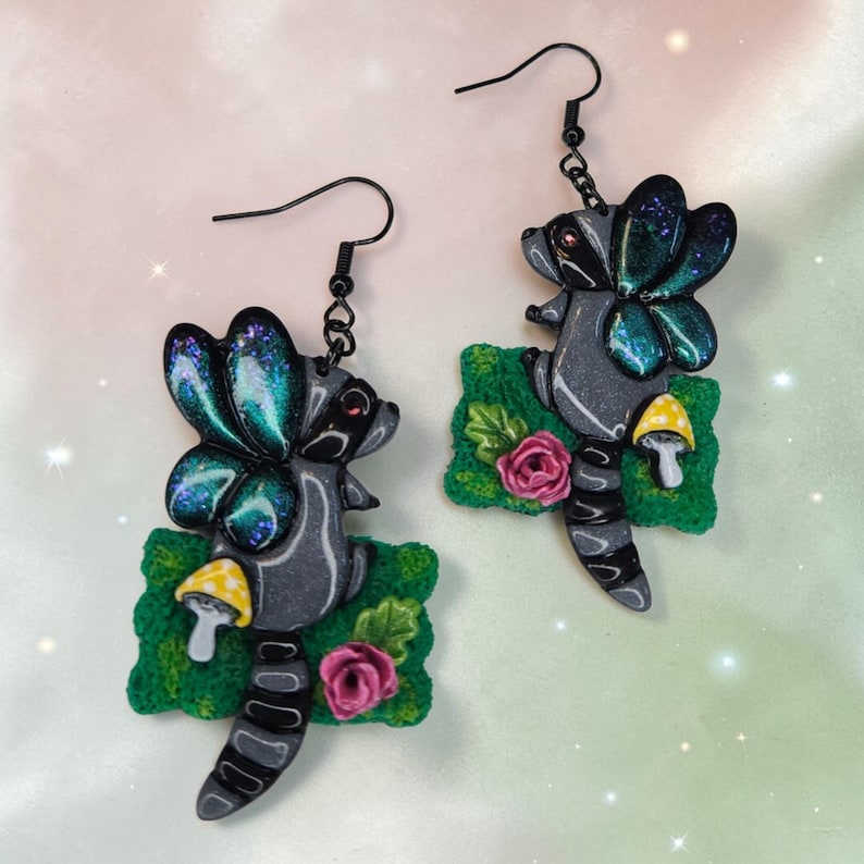 Whimsical Raccoon Fairy Polymer Clay Earrings with Pink Rose & Yellow Toadstool
